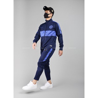 Bộ quần áo khoác Chelsea 2021 màu xanh.