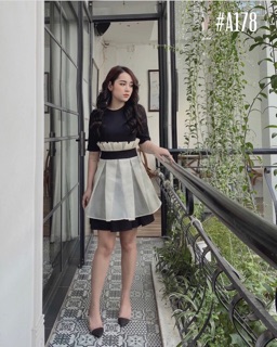 Đầm phối màu xếp ly