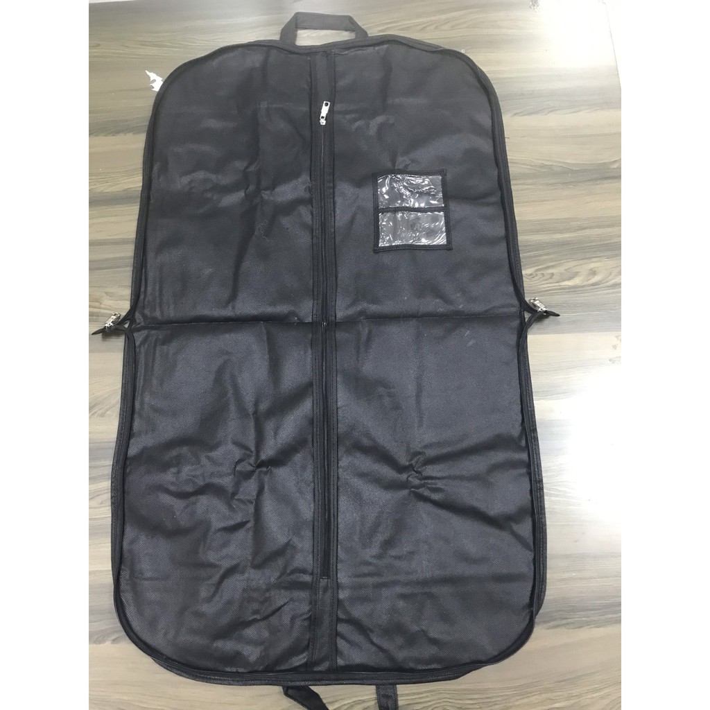 Túi đựng vest có quai xách - kích thước 60 x 100, chất liệu vải không dệt dày dặn.