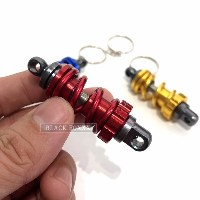 Móc khoá xe máy kiểu lò xo hình phuộc