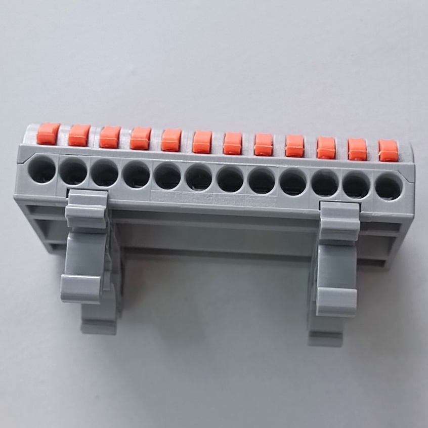 Cút Nối Dây Điện nhanh thông minh gắn trên ray 12P 12 cổng vào 12 cổng ra PCT-2212D màu xám chốt màu cam
