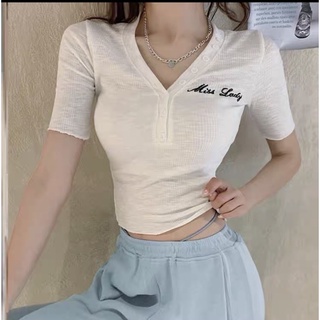 Áo kiểu cổ v có nút trắng đen nu