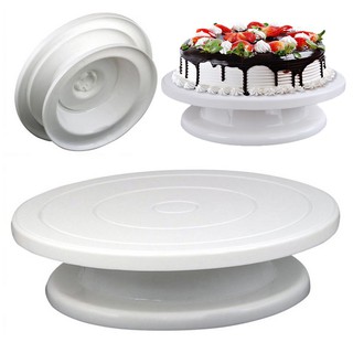 Rotating base holder for cake decoration
