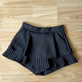 Quần váy kiểu xếp ly