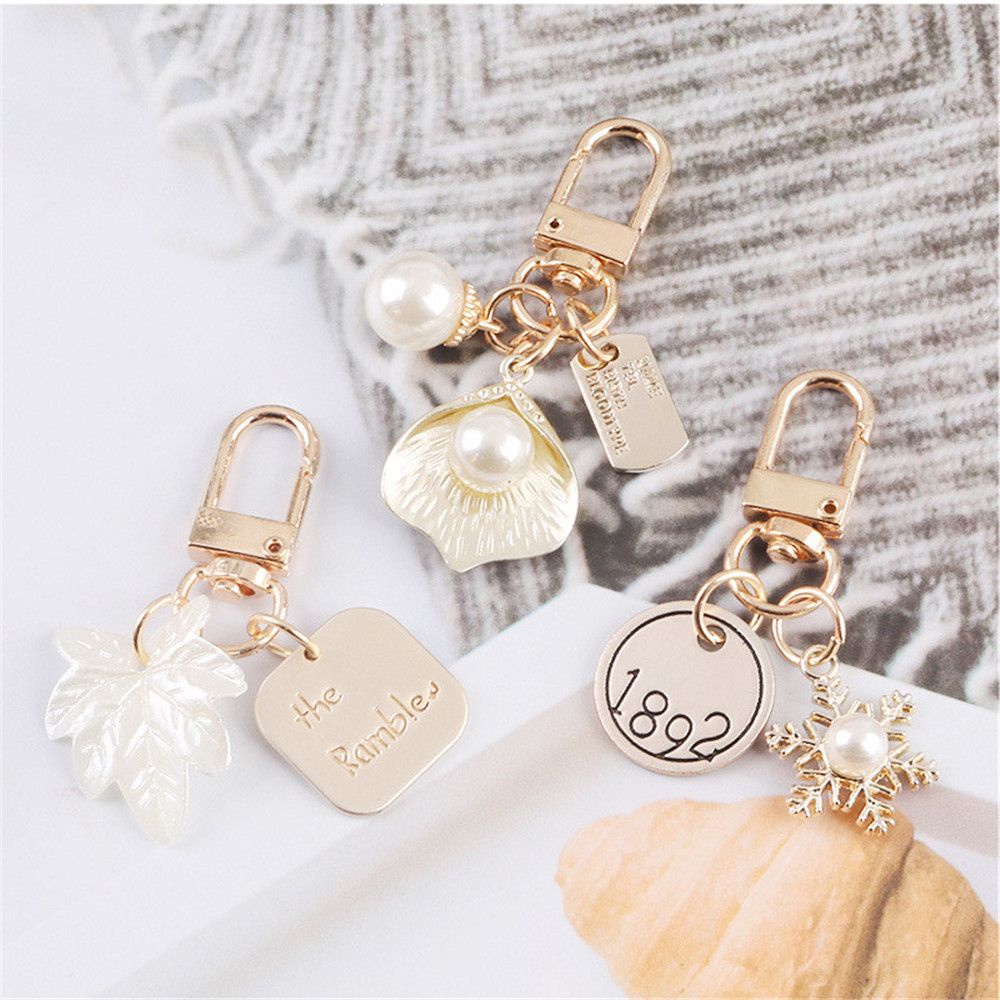 Móc khóa hình chiếc lá dễ thương MIHAN1