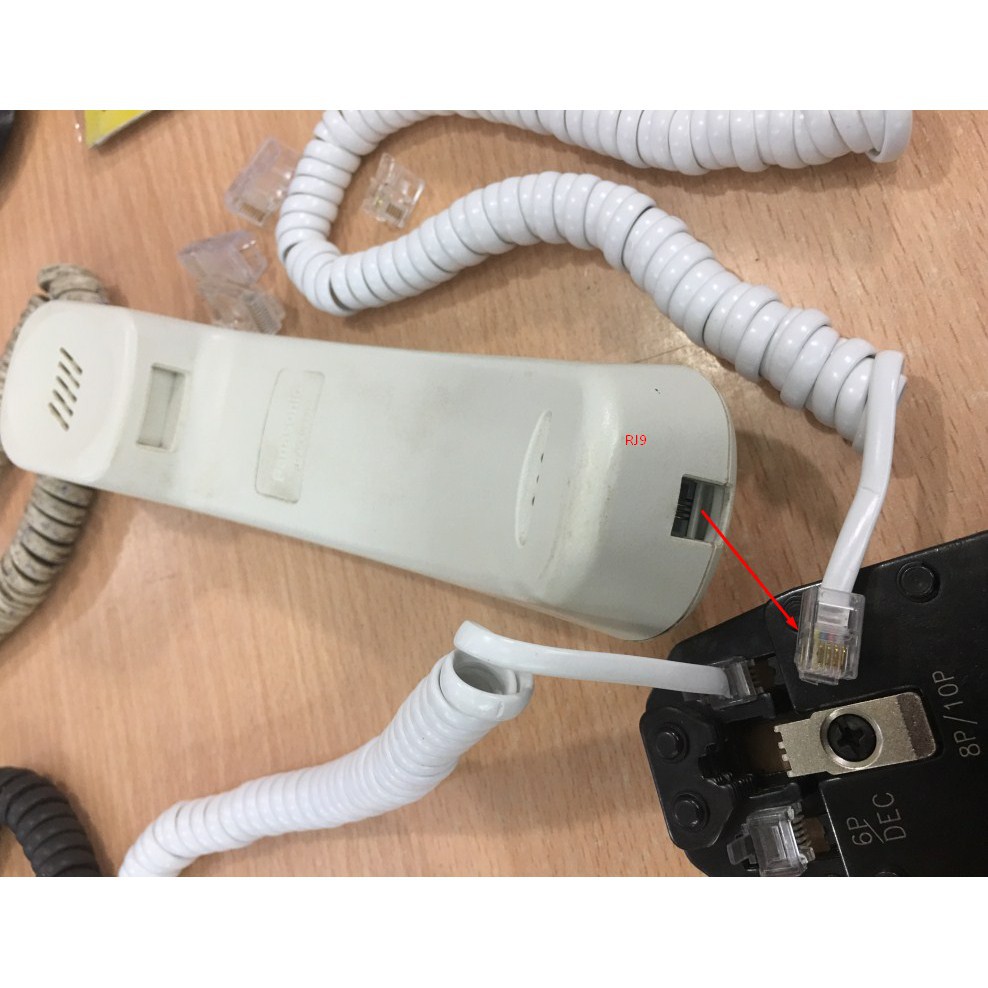 Dây tai nghe cho điện thoại bàn RJ9 2 mét xoắn lò xo - RJ9 cable Telephone Panasonic