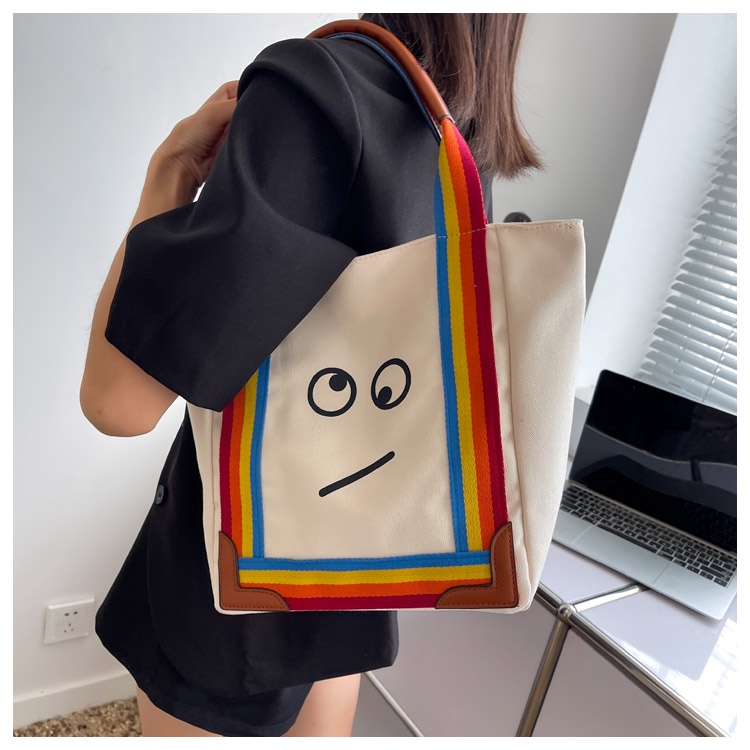 Túi xách mặt cười quai dài