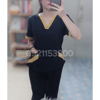 Đồng phục spa màu đen viền vàng