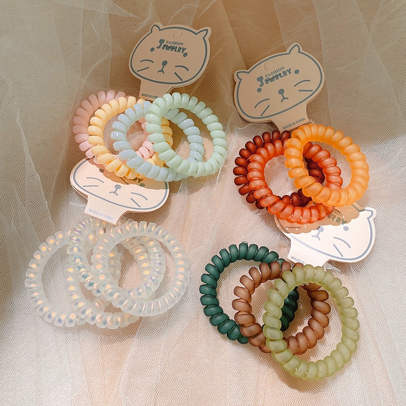 Dây cột tóc set buộc tóc lò xo nhựa phủ nhám và trơn bóng ( Mẫu 2 )