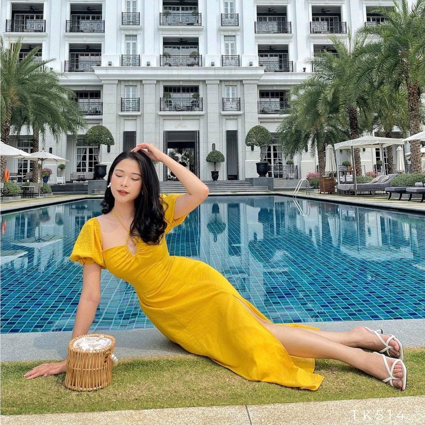 Đầm xòe xẻ tà tay phồng khoét ngực buộc dây