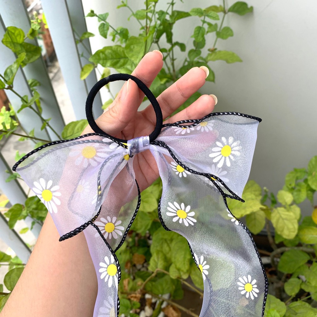 Cột tóc nơ hoa cúc viền đen