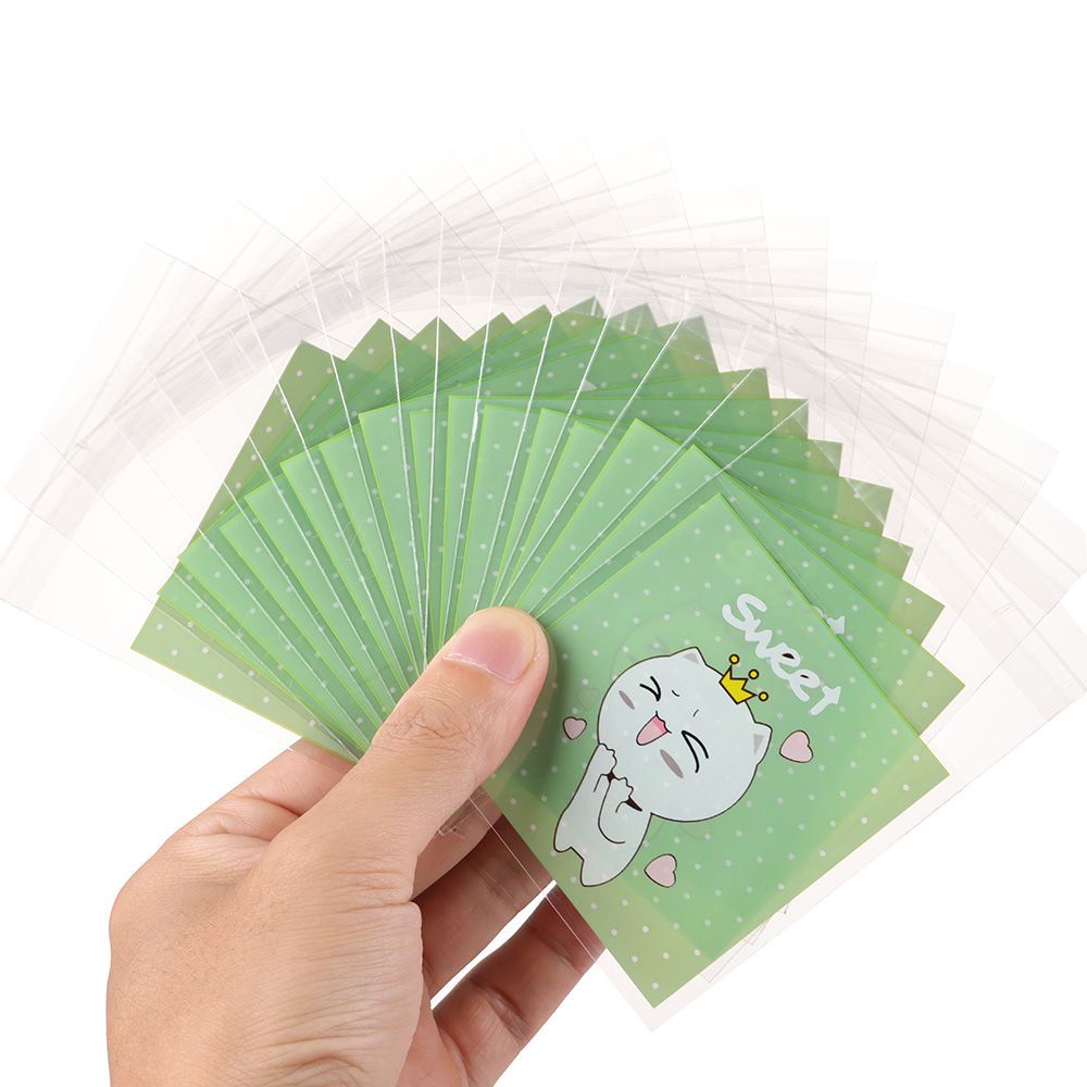 Set 100 Túi Nhựa OPP Kích Thước 7x7cm In Họa Tiết Mèo Hoạt Hình Có Keo Dán Dùng Để Đựng Bánh Quy