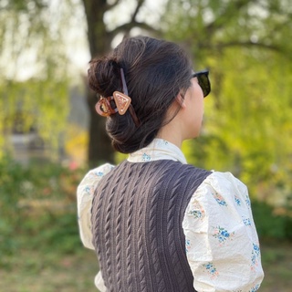 Kẹp tóc Prada,