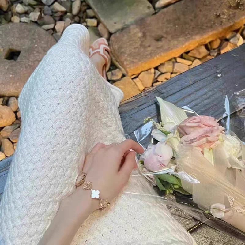 Set áo ba lỗ croptop buộc dây eo và chân váy dài len sexy ullzang