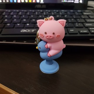 Móc khoá Heo con chơi thú nhún