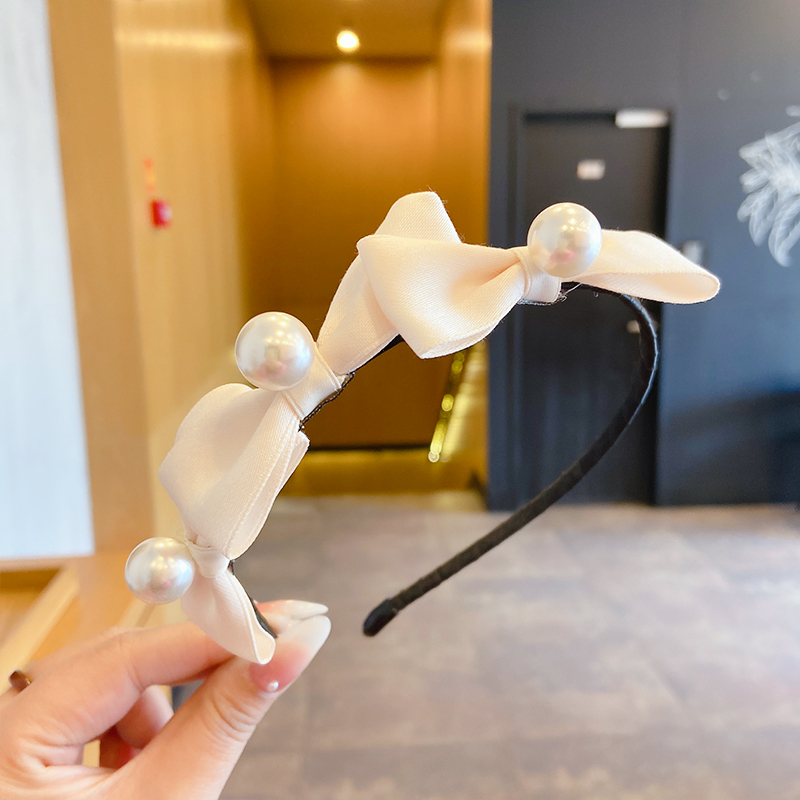 Băng đô cài tóc đính nơ và ngọc trai thời trang Hàn Quốc