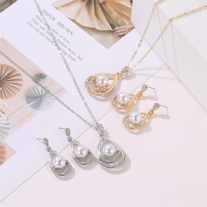 Bộ dây chuyền + bông tai đính hạt ngọc trai kiểu dáng sành điệu