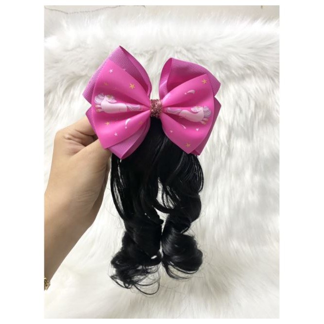 Kẹp nơ tóc xoăn cho bé