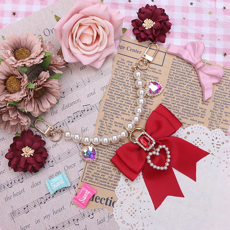 MÓC KHÓA, DÂY TREO TÚI XÁCH NƠ ĐÍNH ĐÁ CAO CẤP 2255