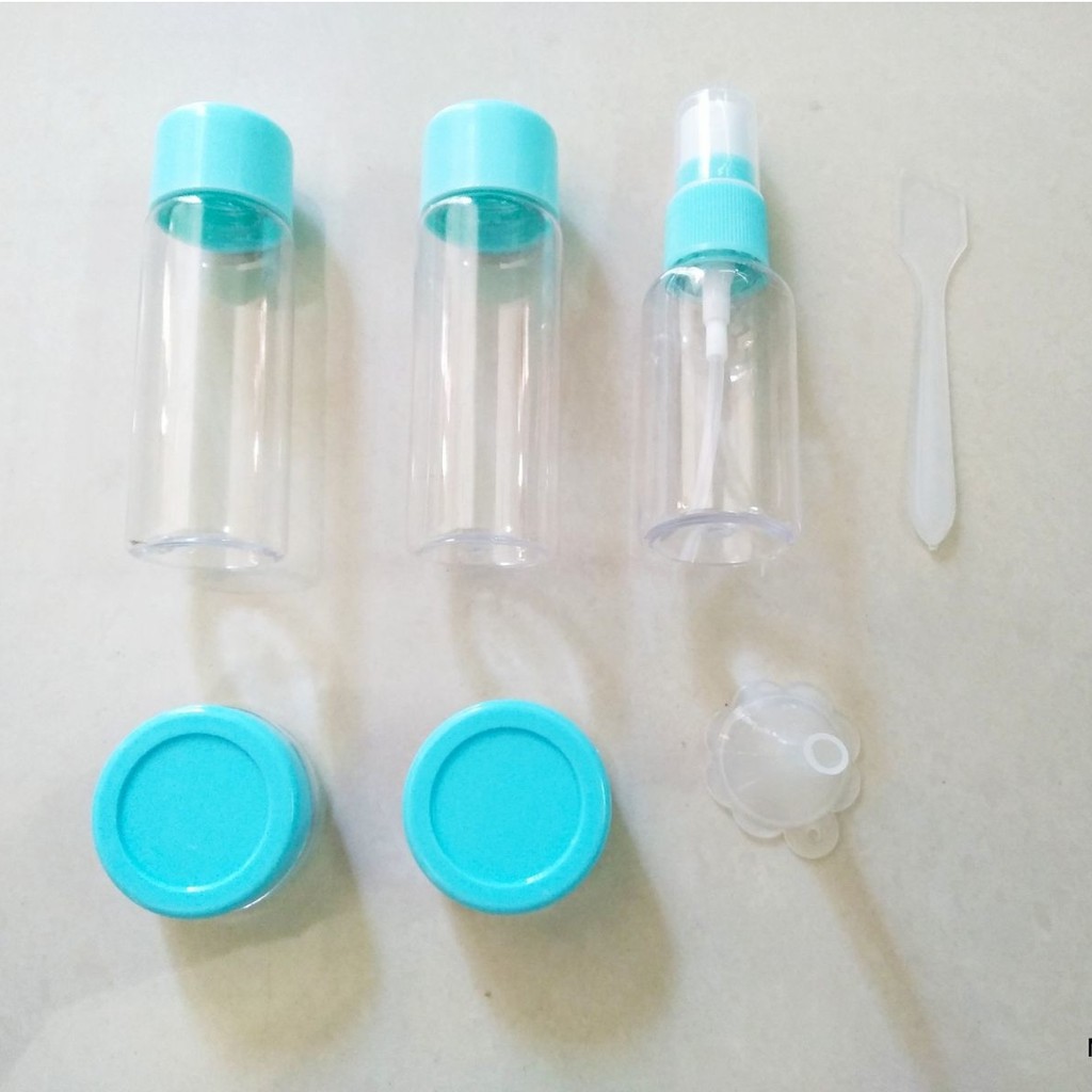 Bộ chiết mỹ phẩm,dầu gội,kem dưỡng.... tiện dụng 7 món ( giao màu ngẫu nhiên xanh hồng ) tặng kèm túi zip