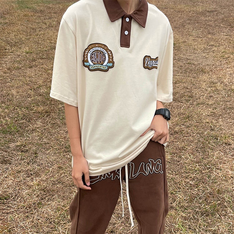 Áo polo Ngắn Tay Dáng Rộng Cổ Đứng Thêu Họa Tiết Đơn Giản Theo Phong Cách Retro Dành Cho Nữ