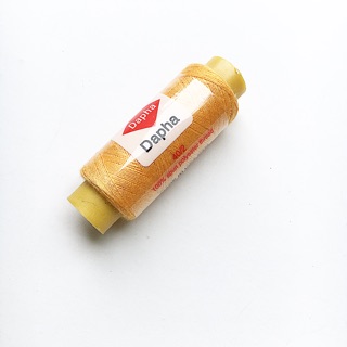 Chỉ cuộn nhỏ ( màu vàng - cam )