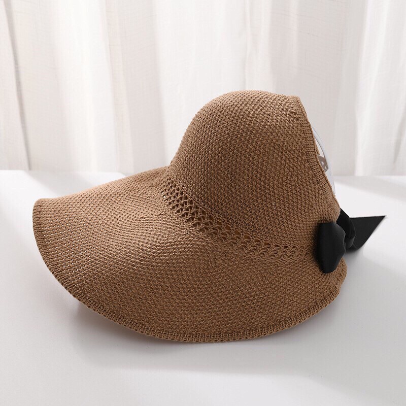 Nón cối rộng vành đính nơ đi biển , dạo phố, nón gấp gọn tiện dụng mang theo.