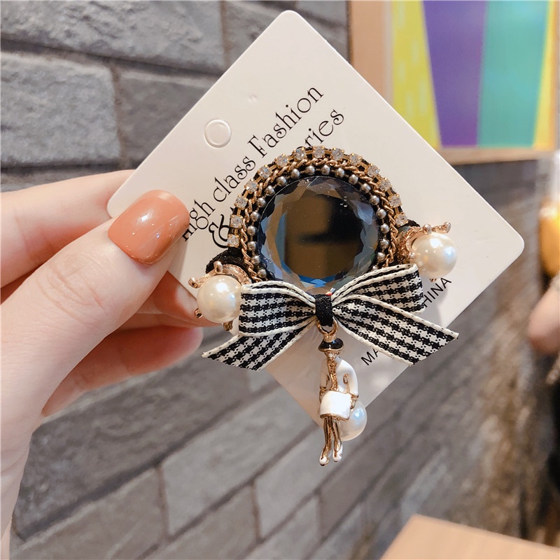 Trâm cài áo hình nơ đính ngọc trai sang trọng