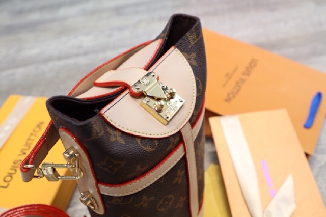 Túi xách nữ hoa nâu xô hothit da mềm fullbox