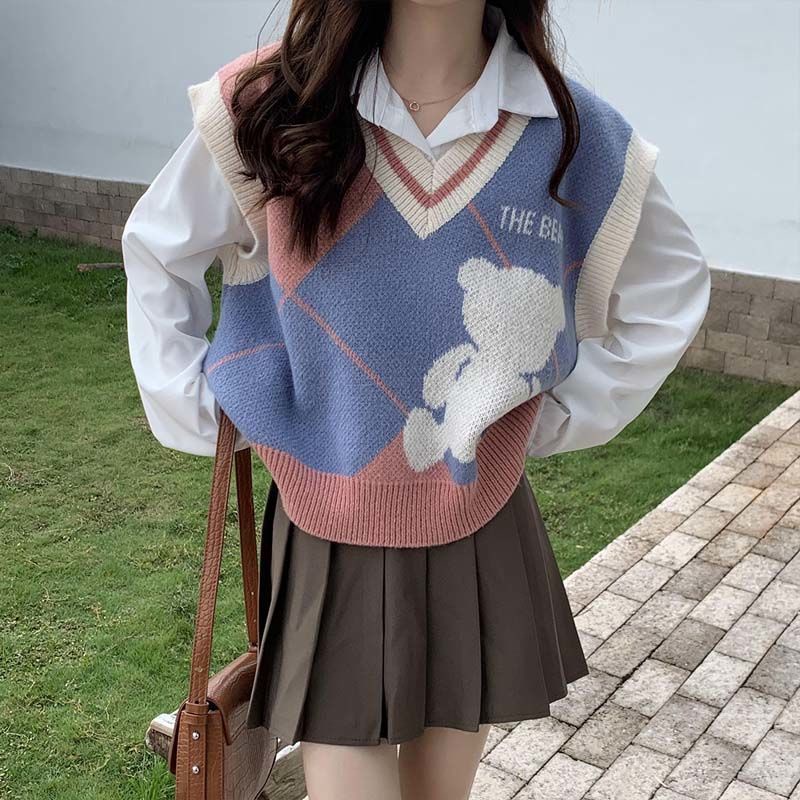 Set áo sơ mi dài tay và áo len không tay thời trang có bán lẻ