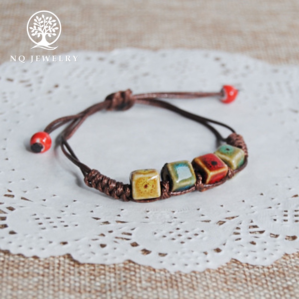 Vòng tay kết dây sáp hạt gốm sứ - NQ Jewelry