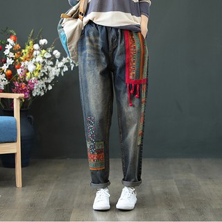 Quần jeans dài nữ chắp vá thổ cẩm
