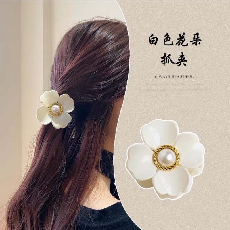 Kẹp tóc bông hoa trà - phong cách thời trang, trẻ trung