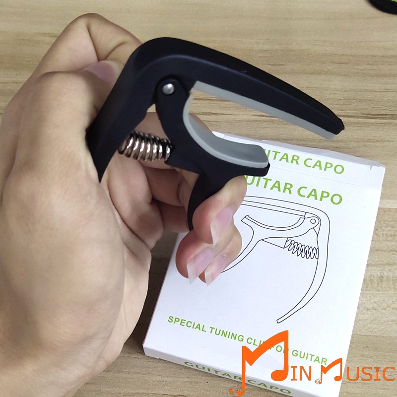 Capo guitar acoustic lò xo có chốt nhổ dây đa chức năng I Hàng Chất Lượng