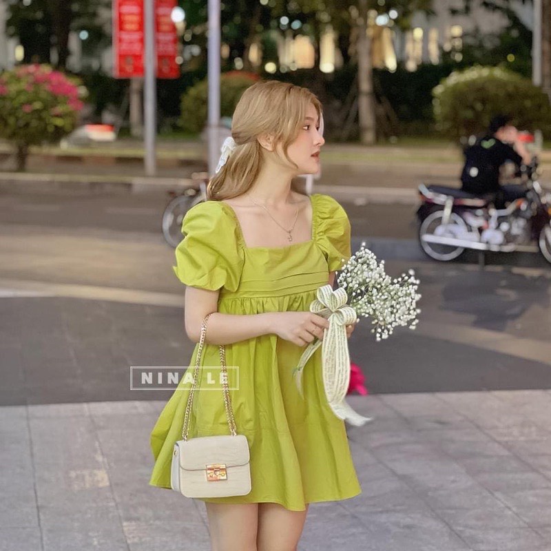 Đầm xòe tay bồng cổ vuông, váy xếp ly ngực thắt nơ sau siêu sang chảnh
