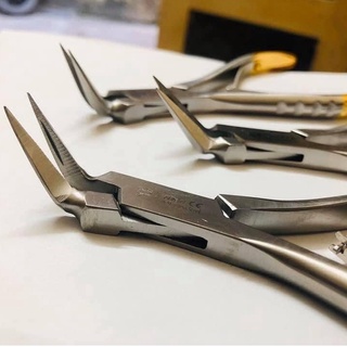 Dụng cụ nha khoa,kìm nhổ chân răng cán vàng 45 độ