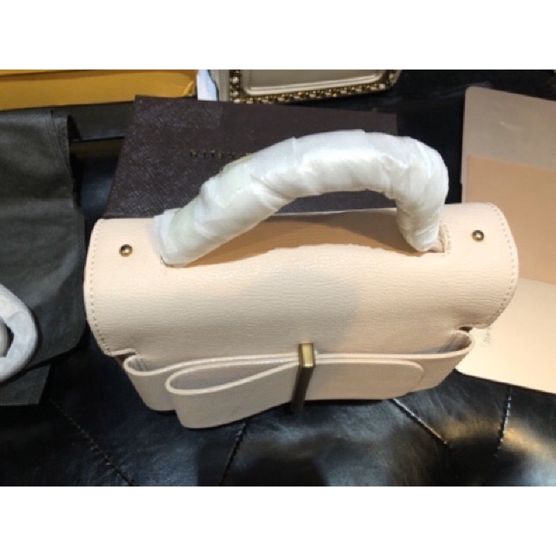 Túi cnk nơ hồng Nude