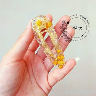 Kẹp tóc hoa baby vàng