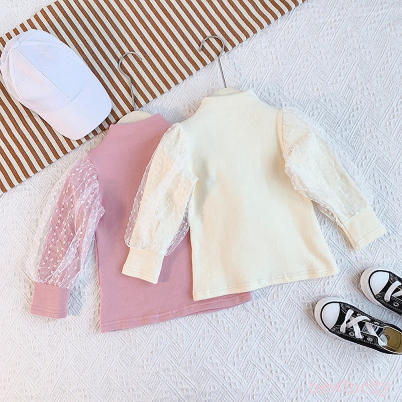 Áo dài tay cổ cao phối lưới họa tiết chấm bi phong cách Hàn Quốc xinh xắn dành cho bé gái