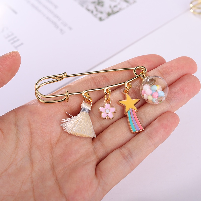 Ghim cài áo trang trí ngôi sao tua rua hạt đá lấp lánh thời trang dành cho cả nam và nữ