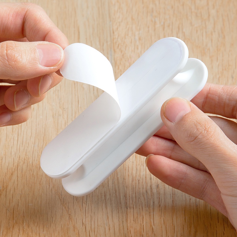 Giá đỡ một mảnh dán tường cho dây cáp sạc điện thoại / tai nghe