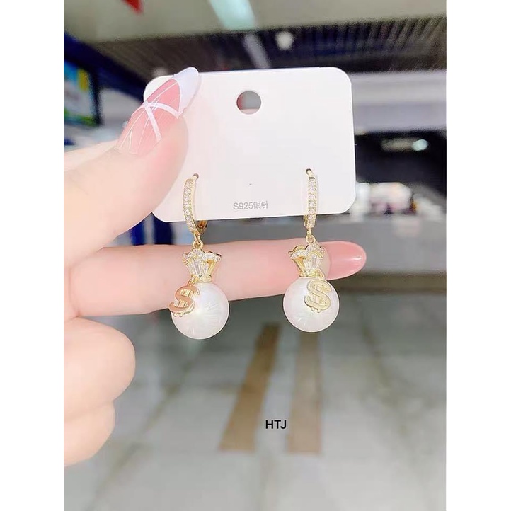 Bông tai túi tiền bạc ta mang lại tài lộc may mắn - Kho sỉ bạc Nhất Linh