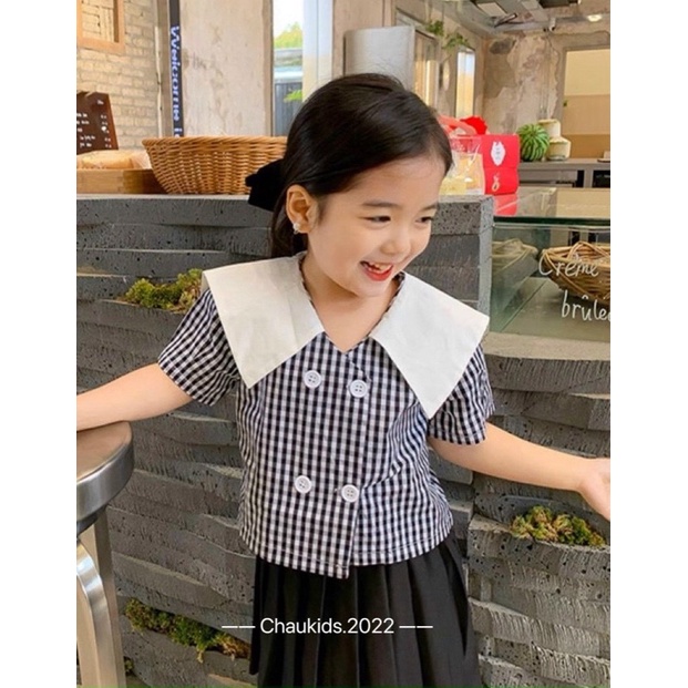 sét áo caro cùng chân váy xếp ly cho bé