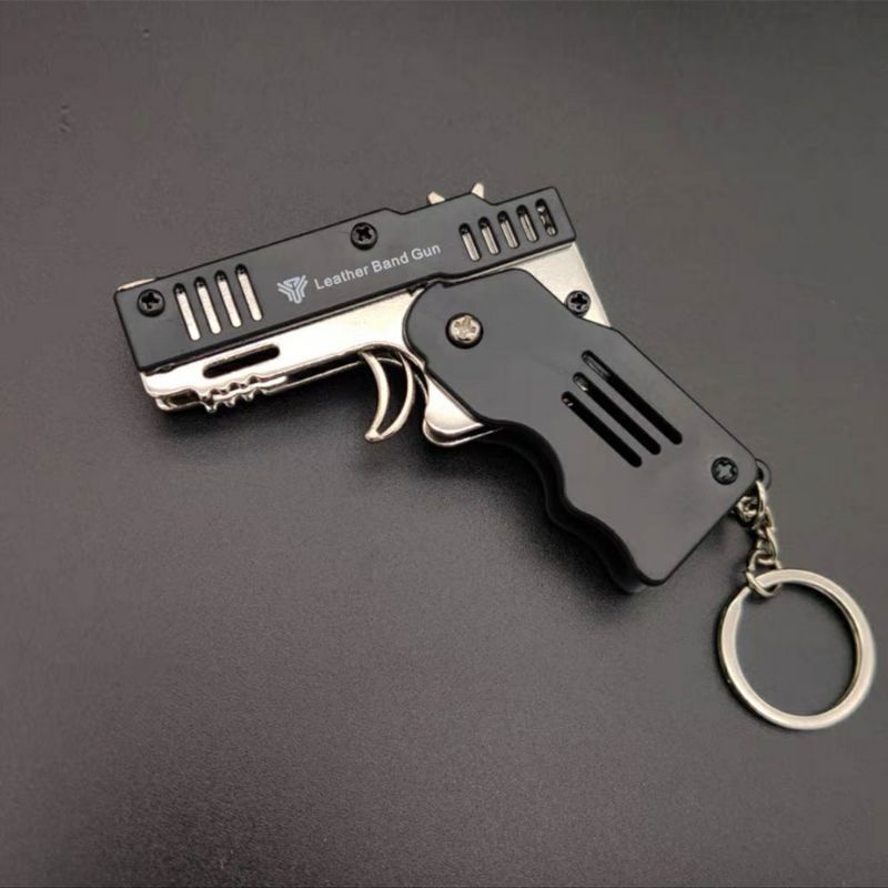 Súng bắn dây thun móc chìa khoá dạng đồ chơi gấp gọn,