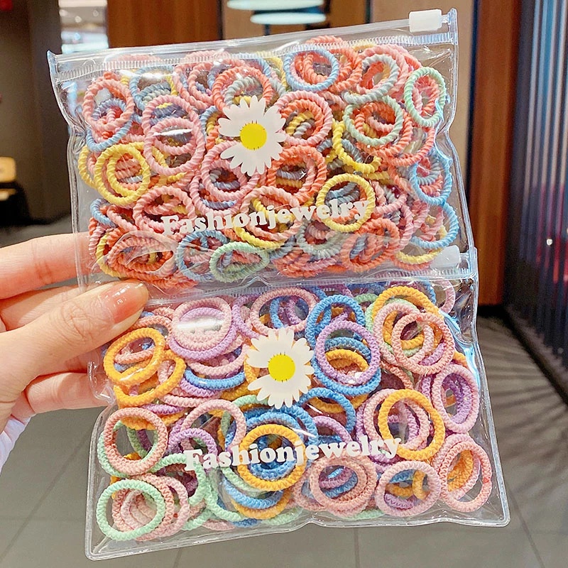 Set 100 dây buộc tóc KIDSBOWS co giãn nhiều màu sắc thời trang cho bé gái