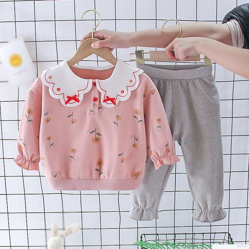 Set áo thun tay dài cổ tròn in họa tiết hoạt hình phối quần dài thời trang mùa thu cho bé gái Se7en