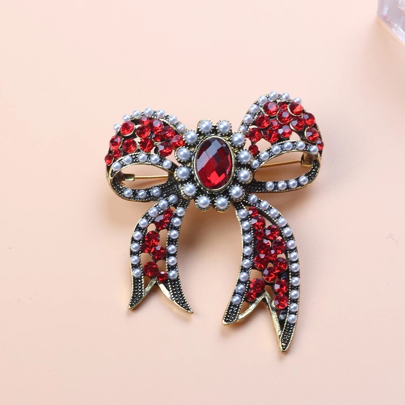 Ghim Cài Áo Hình Nơ Đính Đá Và Ngọc Trai Thiết Kế Sang Trọng
