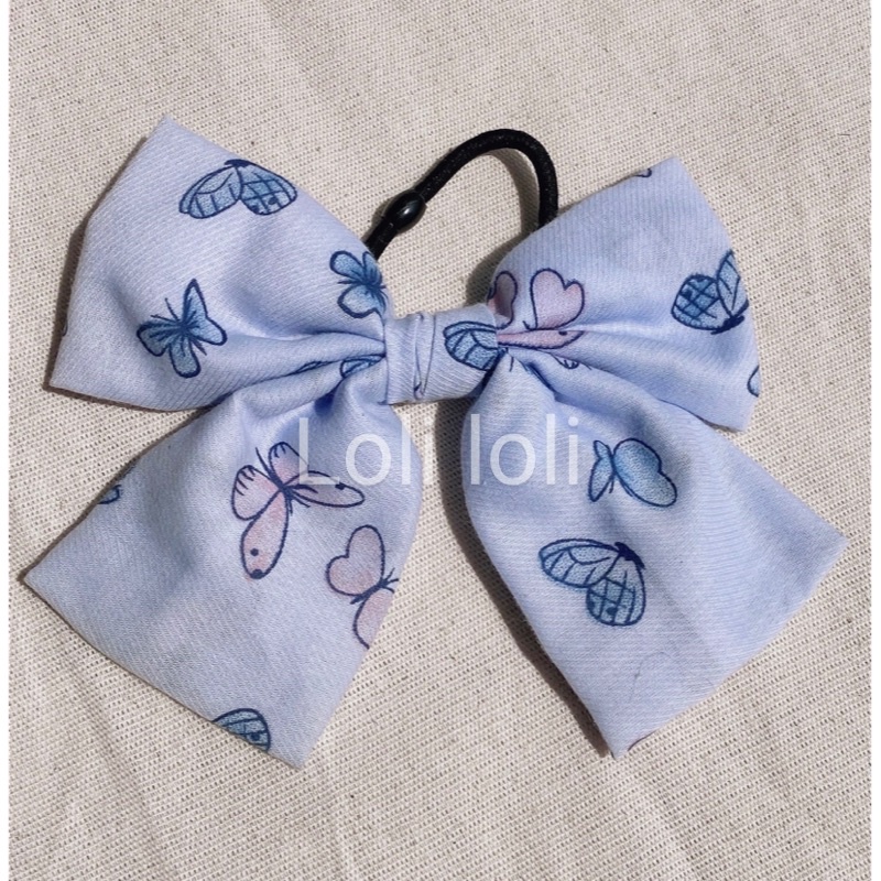 Cột  tóc nơ bướm xinh xắn hot trend dành cho nàng thêm xinh