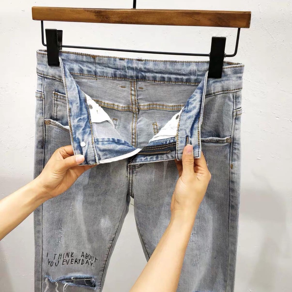 Quần jean nam ống ôm màu xanh trơn rách thêu chữ chất bò co giãn bốn chiều thời trang cao cấp NEWSHOP9600