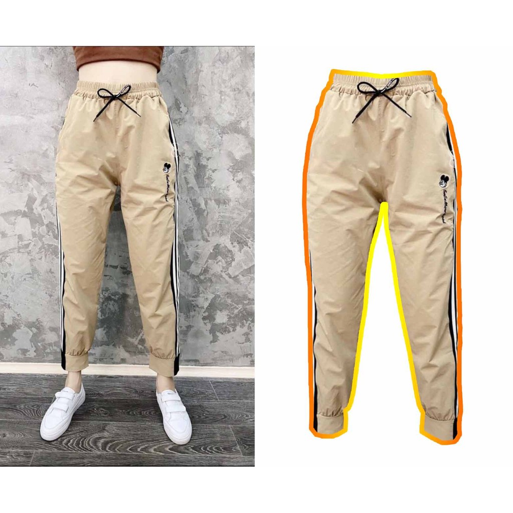 [FREESHIP- Ảnh Thật] Quần gió nữ phối sọc trắng đen bo gấu dáng jogger trẻ trung năng động/Quần Gió Thể Thao Nữ